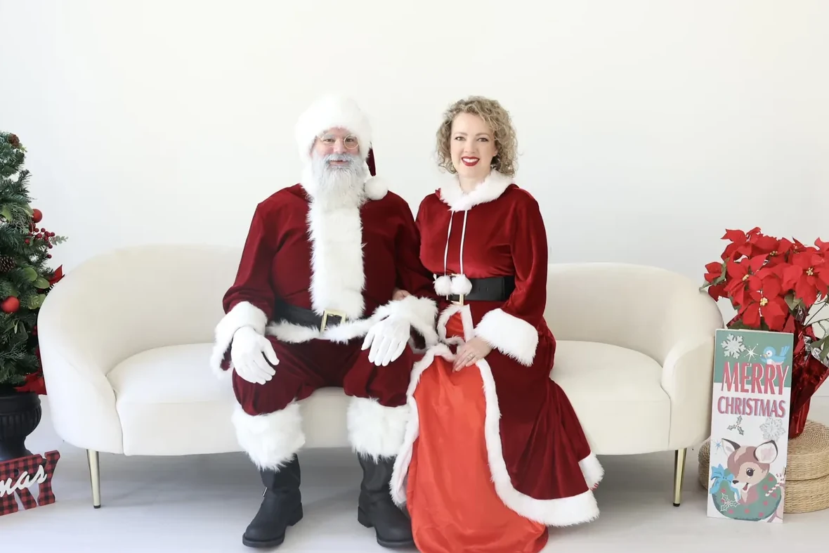 Santa and Mrs. Claus in an elegant Christmas portrait