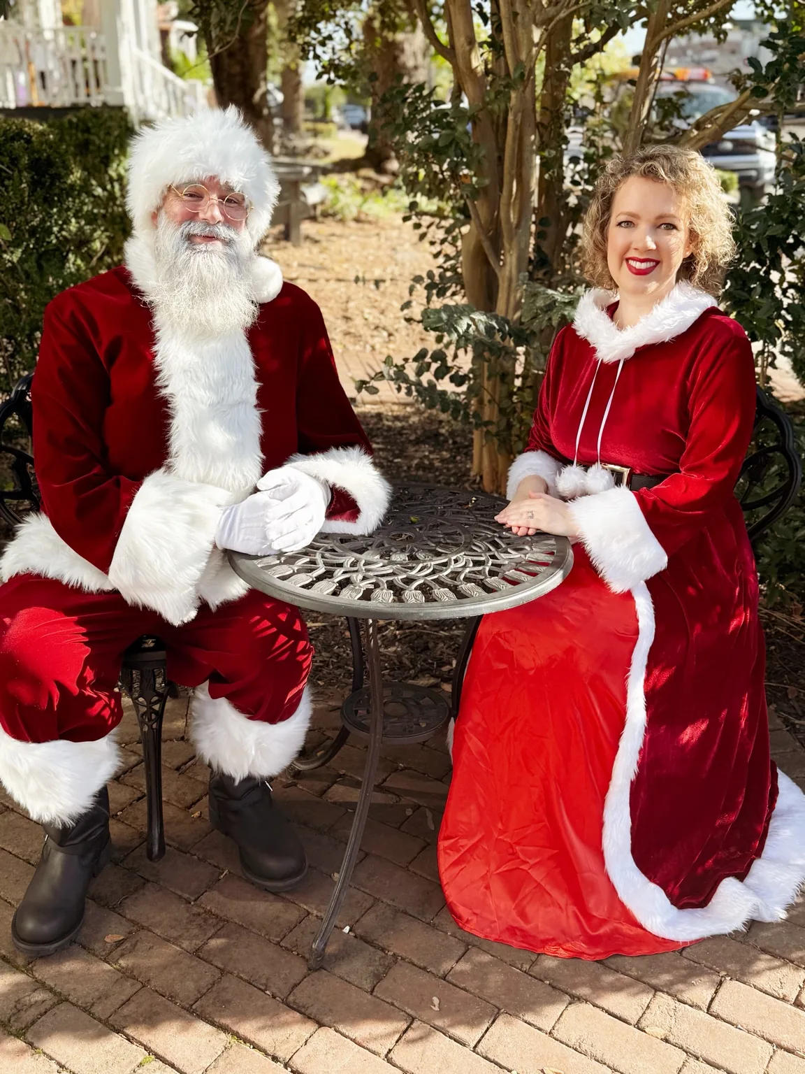 Santa and Mrs. Claus together in the garden